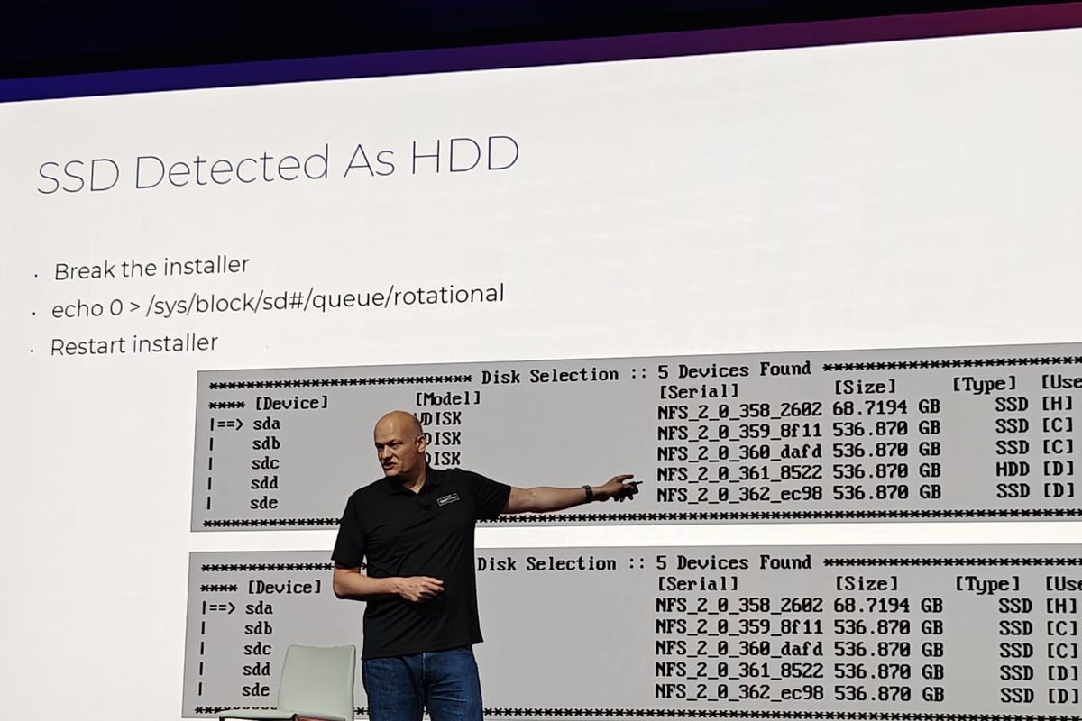 Jeroen on stage at Nutanix .NEXT 2025, pointing at a slide about the Community Edition installer